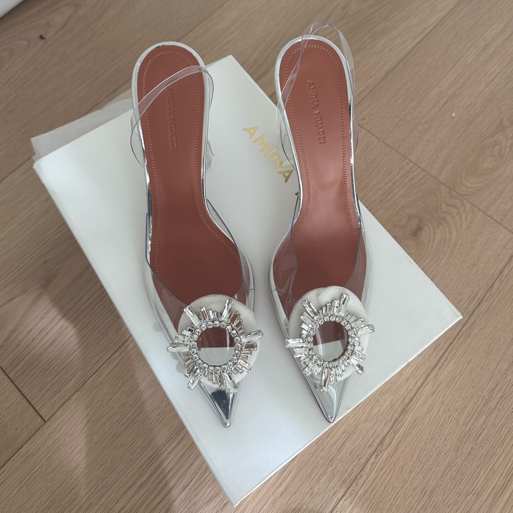 Amina muaddi heals
